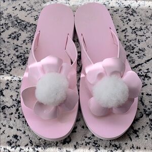 UGG Poppy Genuine Shearling flip flop big kid